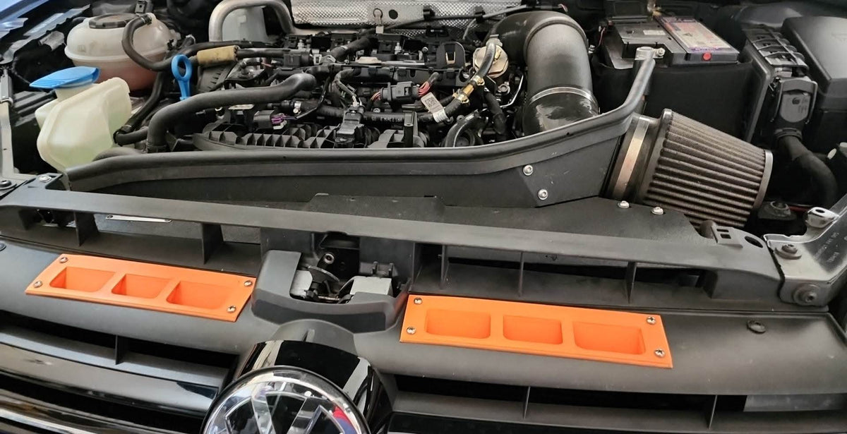 Vue d'ensemble compartiment moteur Golf R avec prises d'air